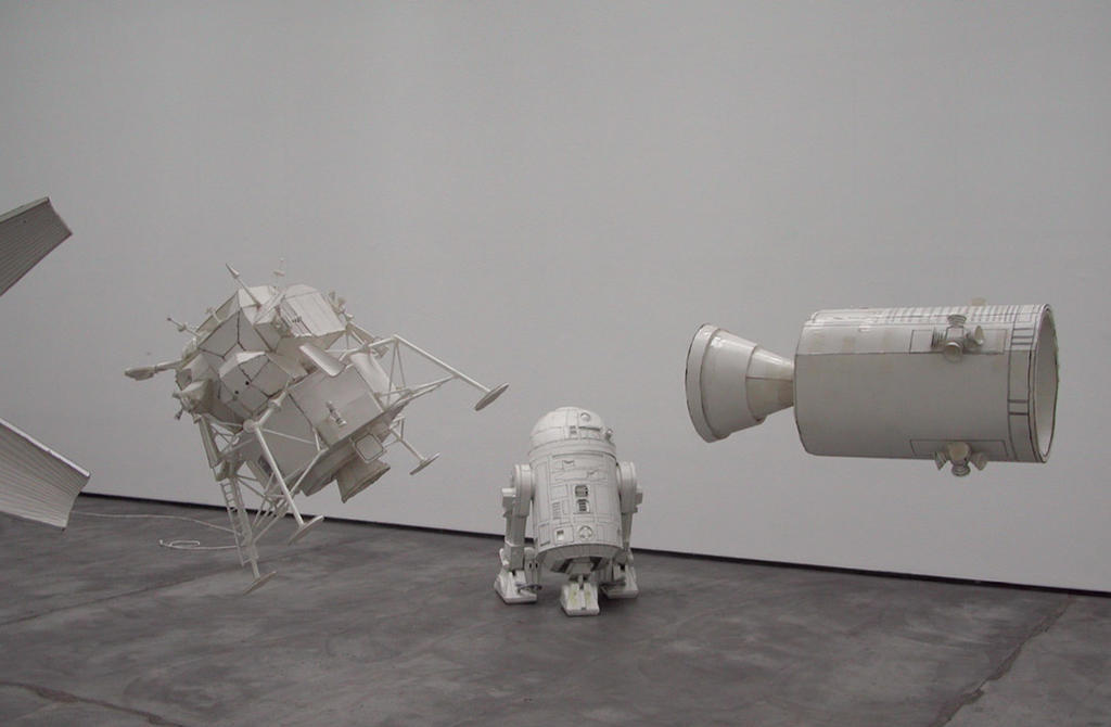 saturn v moon rocket (1/18 scale) (detail), 1999, foamcore, thermal adhesive, ink 58.3 cm / R2D2 (1:1 foamcore model), 2000, foamcore, thermal adhesive, triple expanding foam, steel armature ink. 106.7 x 76.2 x 76.8 cm saturn v moon rocket (1/18 scale) (detail), 1999, foamcore, thermal adhesive, ink 58.3 cm / R2D2 (1:1 foamcore model), 2000, foamcore, thermal adhesive, triple expanding foam, steel armature ink. 106.7 x 76.2 x 76.8 cm